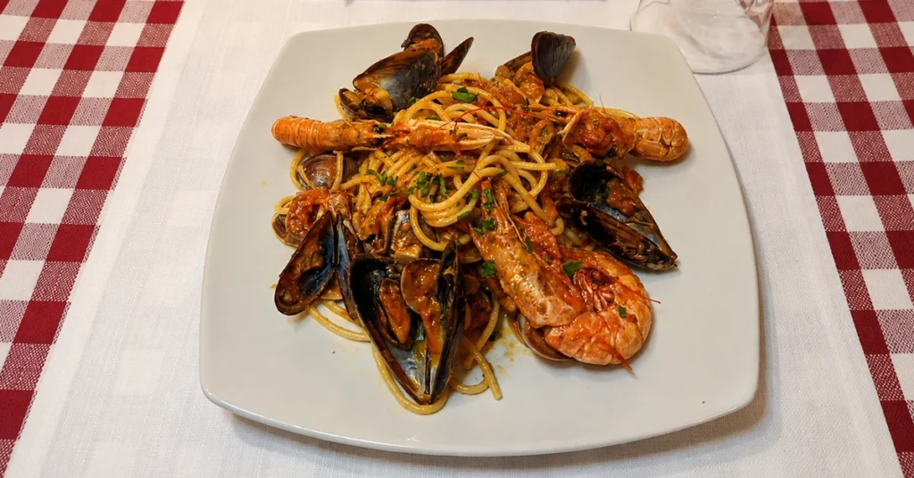 Risotto and Spaghetti allo Scoglio (seafood)